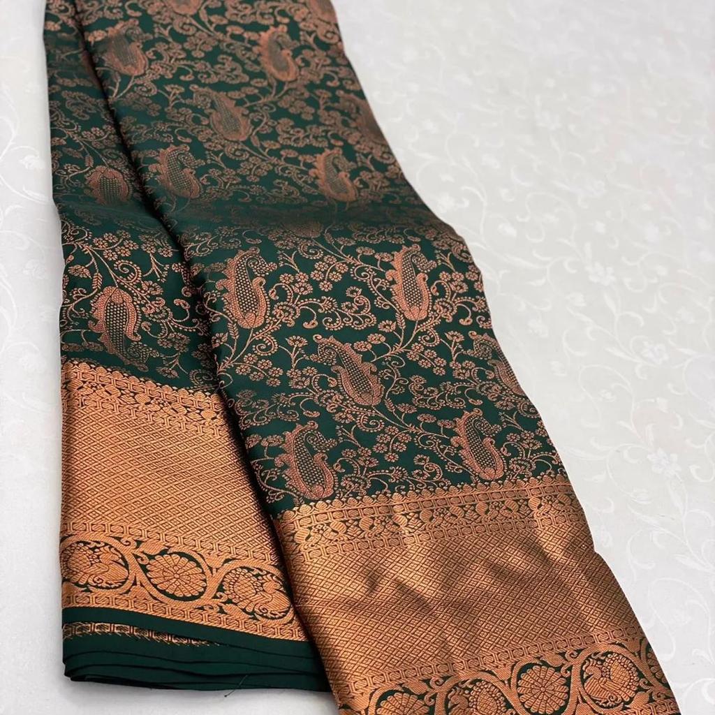 Fragrant Dark Green Soft Silk Saree With Delectable Blouse Piece