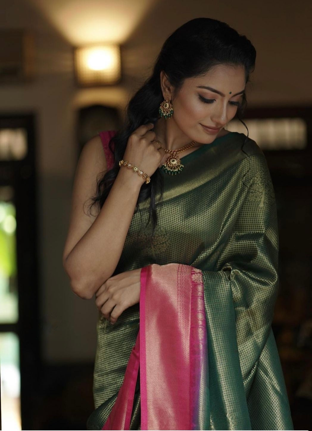 Enchanting Dark Green Soft Silk Saree With Fantabulous Blouse Piece