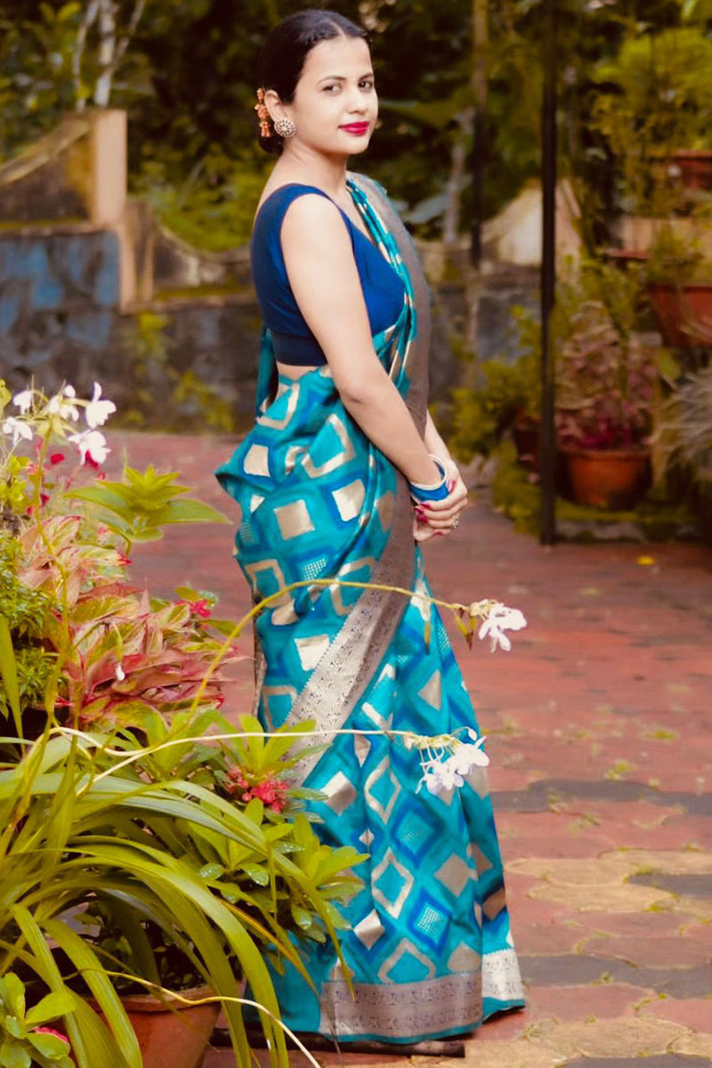 Majestic Firozi Soft Silk Saree With Aplomb Blouse Piece