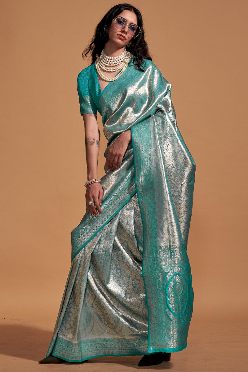 Demure Sea Green Kanjivaram Silk Saree With Ornate Blouse Piece