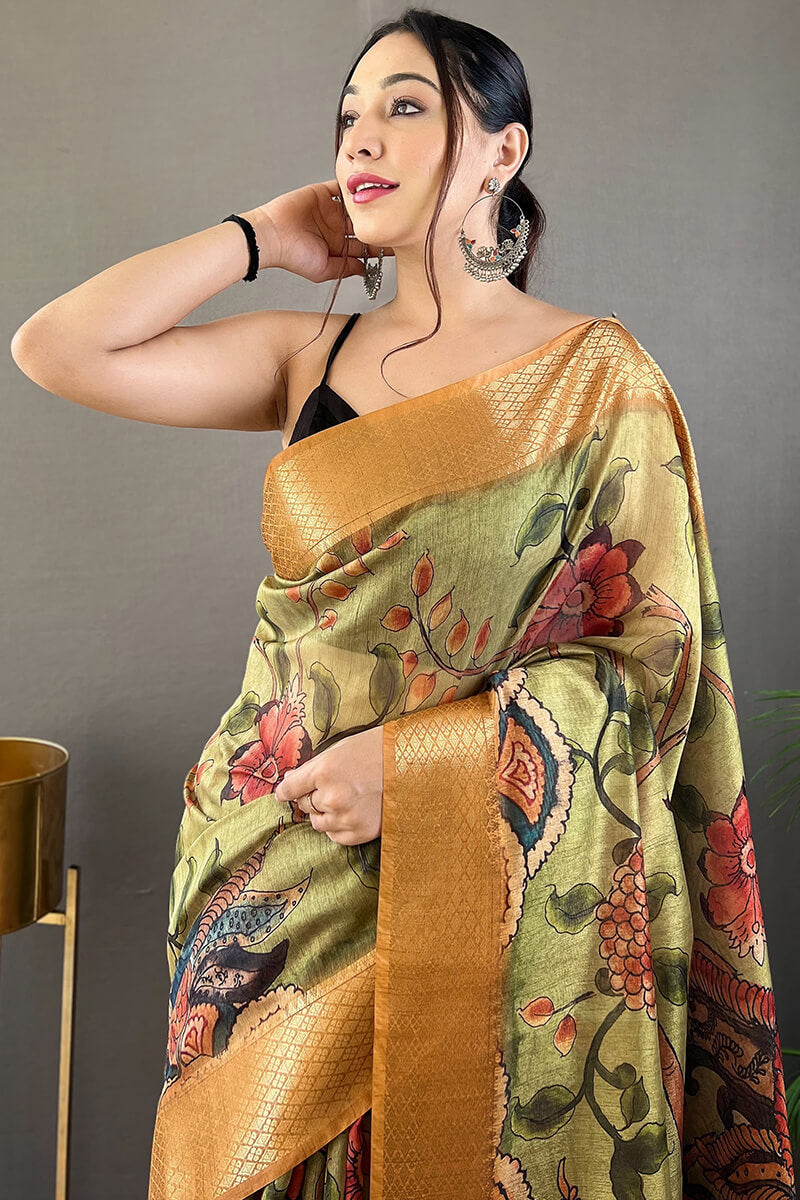 Incredible Green Kalamkari Printed Saree With Ratatouille Blouse Piece