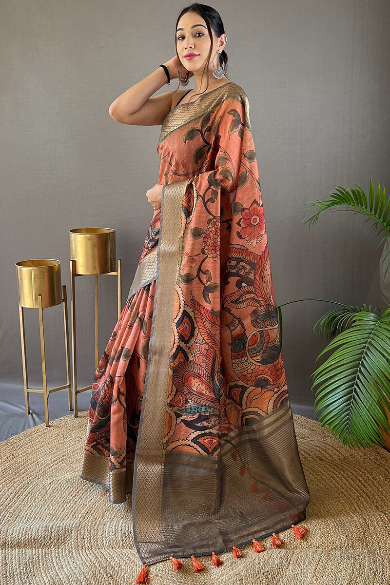 Arresting Orange Kalamkari Printed Saree With Stunner Blouse Piece