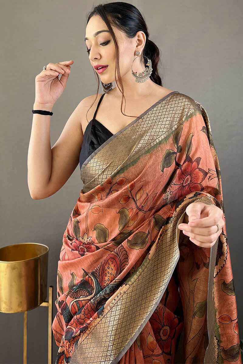 Arresting Orange Kalamkari Printed Saree With Stunner Blouse Piece