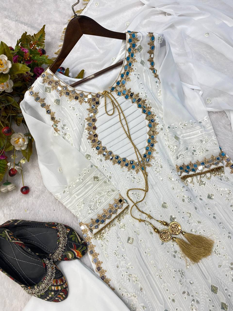 Desirable Faux Georgette Embroidered Suit with Real Mirror Work and Dupatta