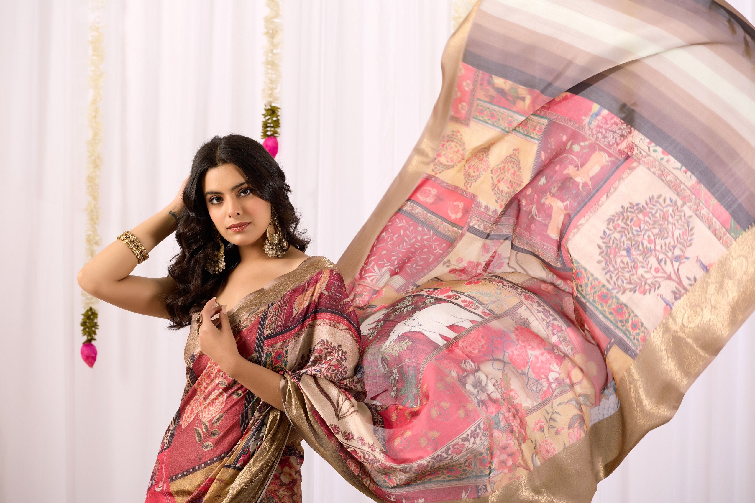 Luxurious Lichi Silk Saree with Elegant Tribal Art Print and Grand Zari Border